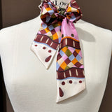 Seidenband schleife kariert rosa bunt